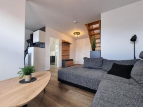 Kompassrose Wohnungen Ferienwohnung Leuchtfeuer